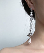 Load image into Gallery viewer, Original Silk Sterling Silver Pearl Asymmetric Saturn Drop Earrings