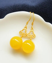 Load image into Gallery viewer, Elegant Yellow Silver Inlaid Beeswax Ball Drop Earrings